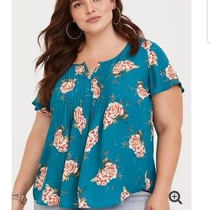 Turquoise floral blouse